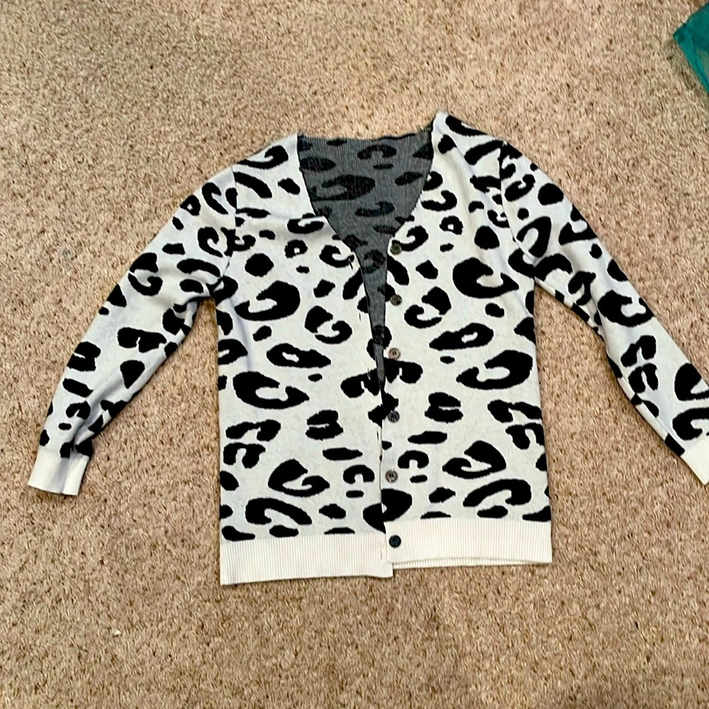 Gently used Leopard print cardigan.